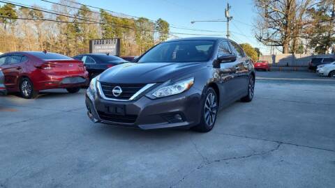 2017 Nissan Altima for sale at DADA AUTO INC in Monroe NC
