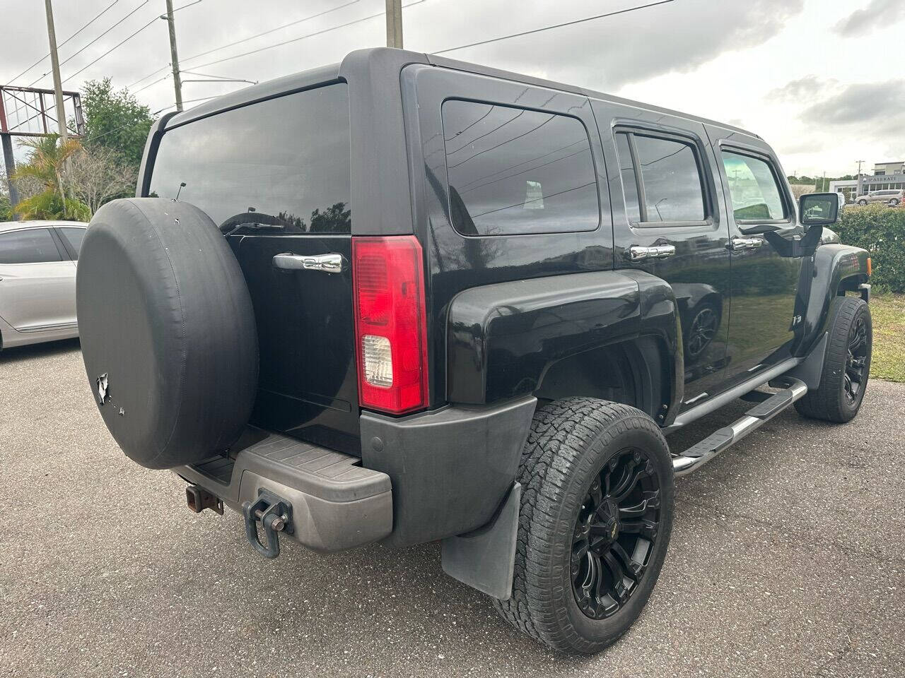 2006 HUMMER H3 for sale at Renown Automotive in Saint Petersburg, FL