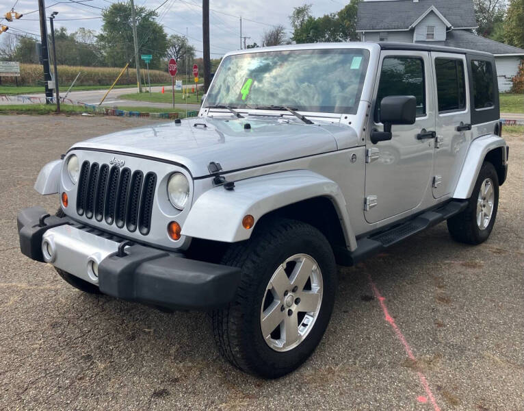 2009 Jeep Wrangler Unlimited for sale at Grims Auto Sales in North Lawrence OH