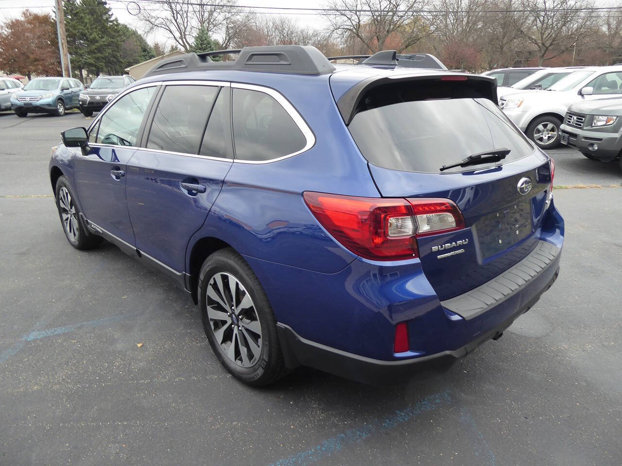 2016 Subaru Outback for sale at Lakeshore Autos in Holland, MI