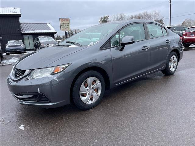 2013 Honda Civic for sale at HUFF AUTO GROUP in Jackson MI