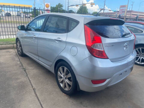 2013 Hyundai Accent for sale at Buy-Fast Autos in Houston TX