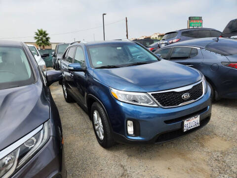 2014 Kia Sorento for sale at E and M Auto Sales in Bloomington CA