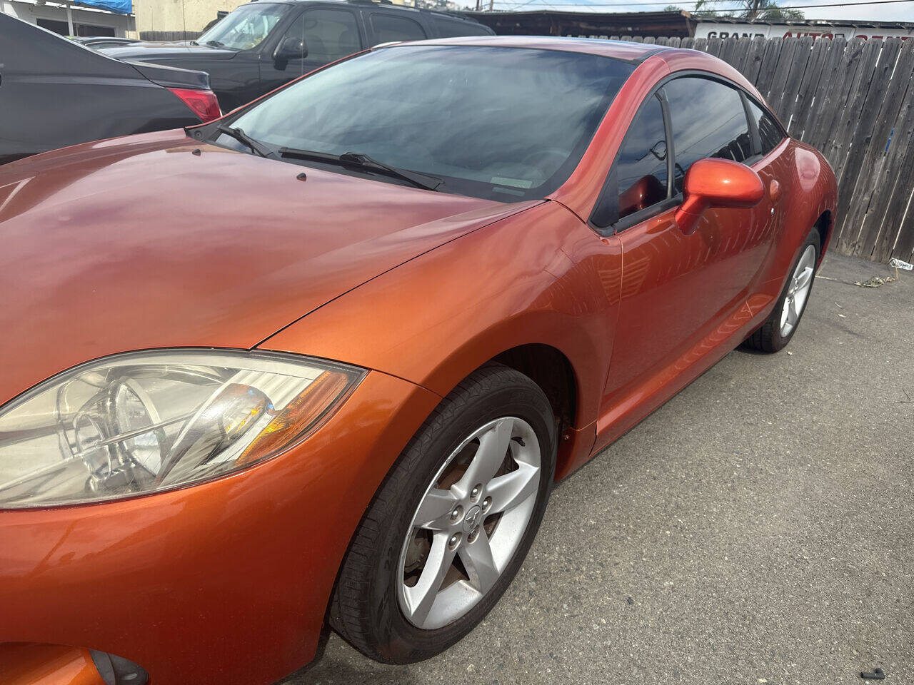 Orange 2007 Mitsubishi Eclipse GS GS 2dr Hatchback (2.4L I4 4A) 2