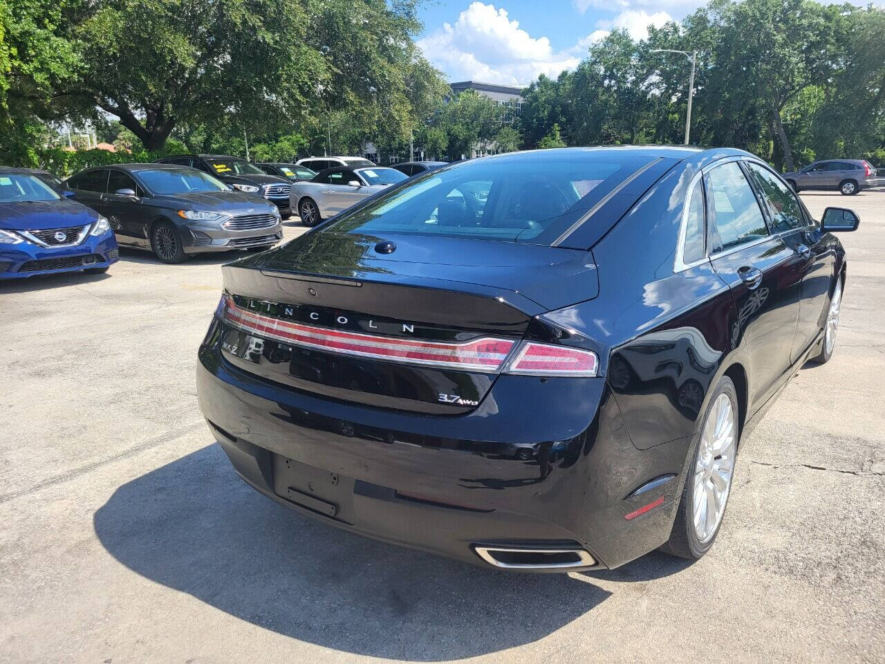 2016 Lincoln MKZ for sale at FAMILY AUTO BROKERS in Longwood, FL