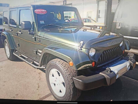 2011 Jeep Wrangler Unlimited for sale at CRYSTAL MOTORS SALES in Rome NY