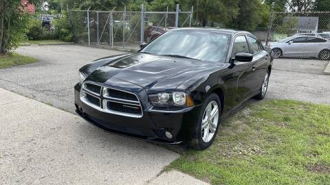 2013 Dodge Charger for sale at The Family Auto Finance in Redford MI