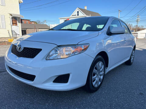 2009 Toyota Corolla for sale at D'Ambroise Auto Sales in Lowell MA