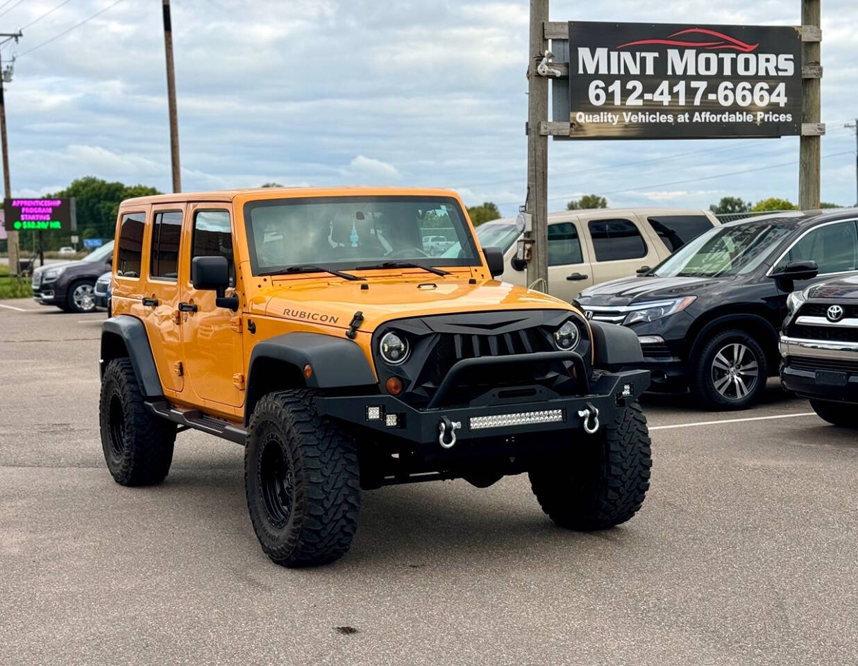 2012 Jeep Wrangler Unlimited for sale at MINT MOTORS in Ramsey, MN