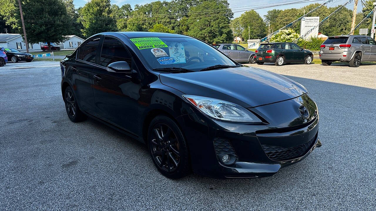 2012 Mazda Mazda3 for sale at North Ridge Auto Center LLC in Madison, OH