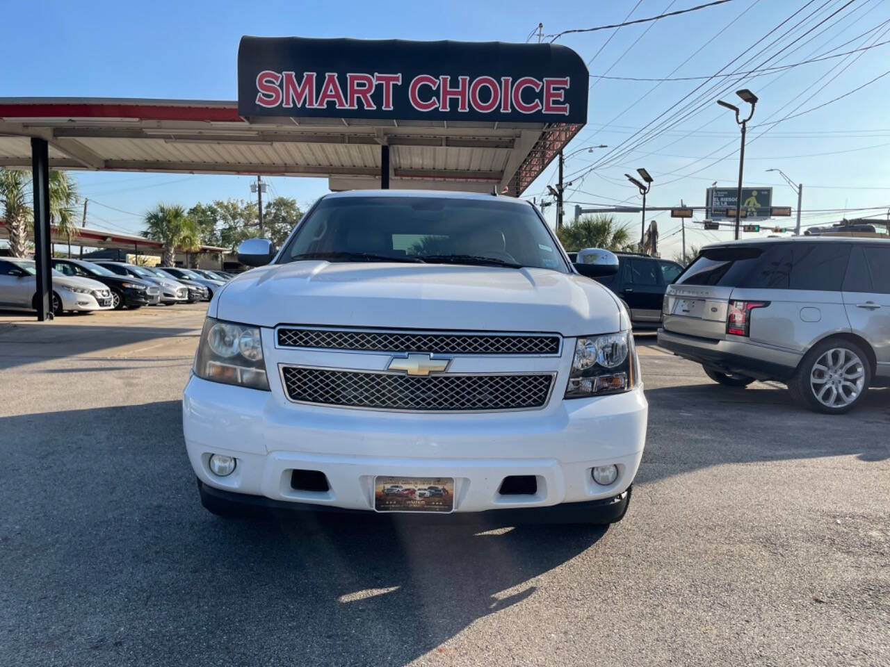 2011 Chevrolet Tahoe for sale at SMART CHOICE AUTO in Pasadena, TX