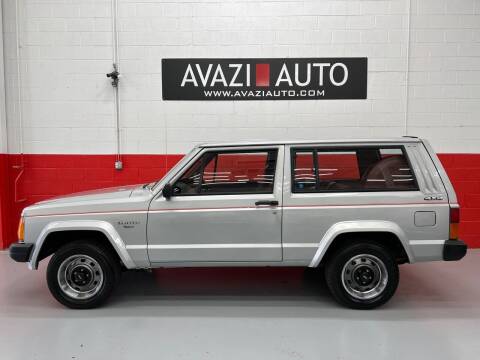 1986 Jeep Cherokee for sale at AVAZI AUTO GROUP LLC in Gaithersburg MD