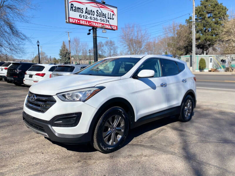 2014 Hyundai Santa Fe Sport for sale at Rams Auto Sales LLC in South Saint Paul MN