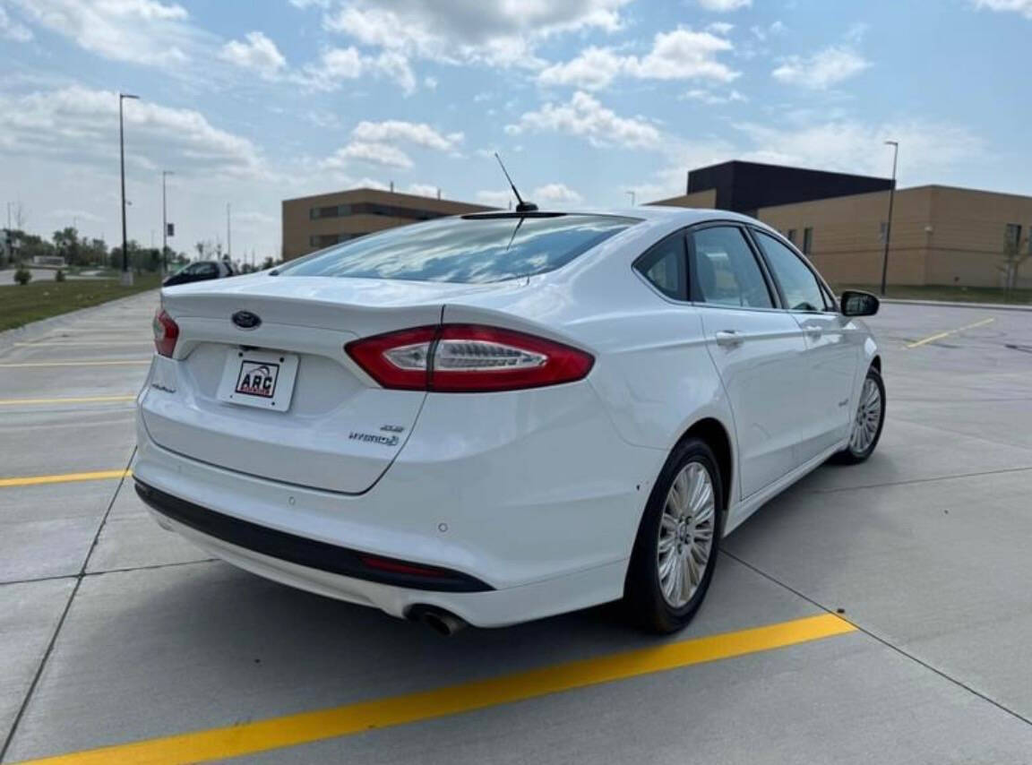 2013 Ford Fusion Hybrid for sale at Arc Auto Sales in Omaha, NE