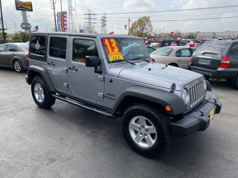 2013 Jeep Wrangler Unlimited for sale at Texas 1 Auto Finance in Kemah TX