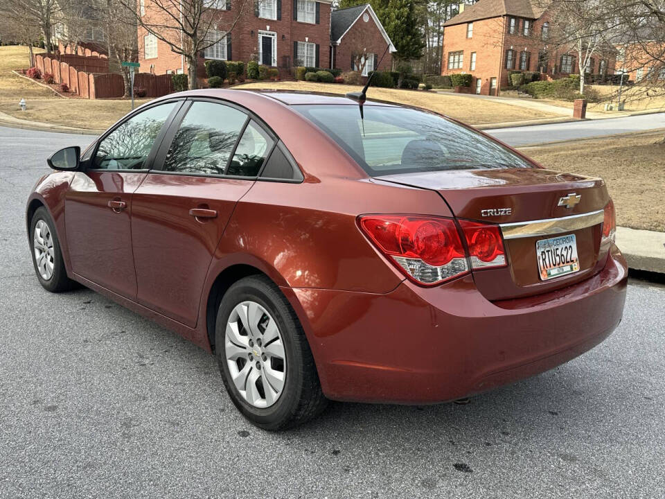 2013 Chevrolet Cruze for sale at SHURE AUTO SALES in Snellville, GA