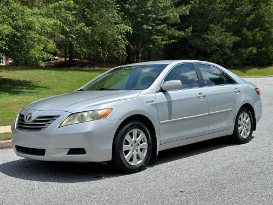 2007 Toyota Camry Hybrid for sale at SHURE AUTO SALES in Snellville, GA