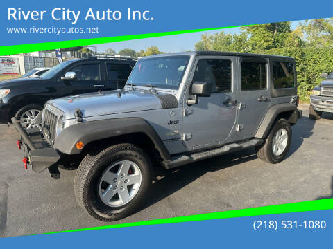 2014 Jeep Wrangler Unlimited for sale at River City Auto Inc. in Fergus Falls MN