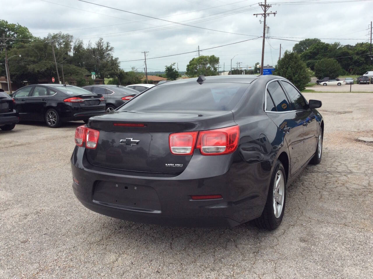 2013 Chevrolet Malibu for sale at SPRINGTIME MOTORS in Huntsville, TX