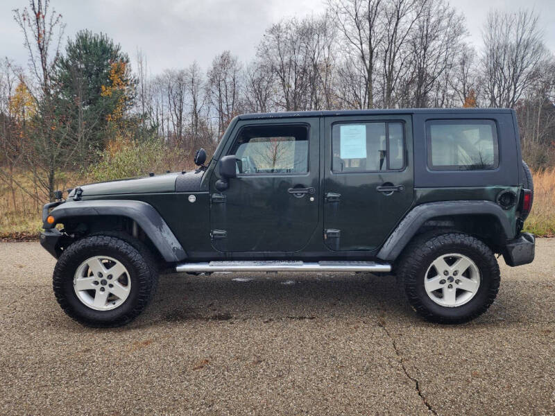 Used 2010 Jeep Wrangler Unlimited Sport with VIN 1J4BA3H14AL126604 for sale in Wooster, OH