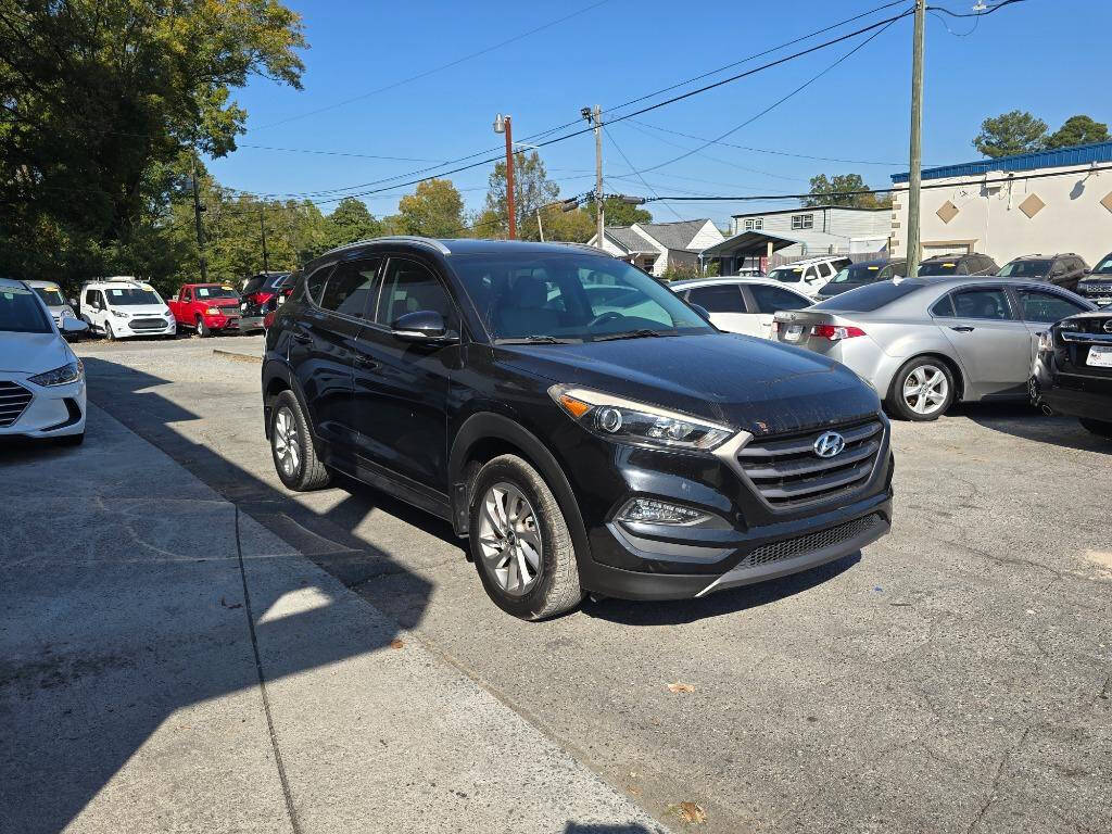 2016 Hyundai TUCSON for sale at DAGO'S AUTO SALES LLC in Dalton, GA