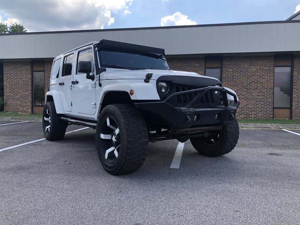 2014 Jeep Wrangler Unlimited for sale at American Customs Llc in Franklin, TN