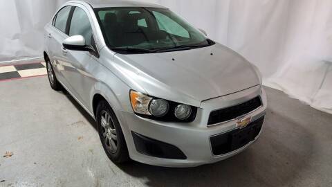2014 Chevrolet Sonic for sale at Tradewind Car Co in Muskegon MI
