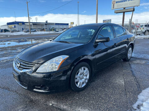 2011 Nissan Altima for sale at BELOW BOOK AUTO SALES in Idaho Falls ID