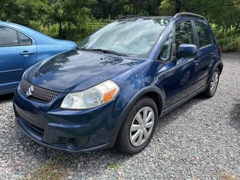 2011 Suzuki SX4 Crossover for sale at R C MOTORS in Vilas NC