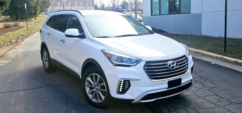 2017 Hyundai Santa Fe for sale at BOOST MOTORS LLC in Sterling VA