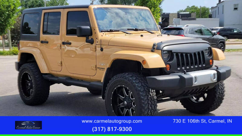 2013 Jeep Wrangler Unlimited for sale at Carmel Auto Group in Indianapolis IN