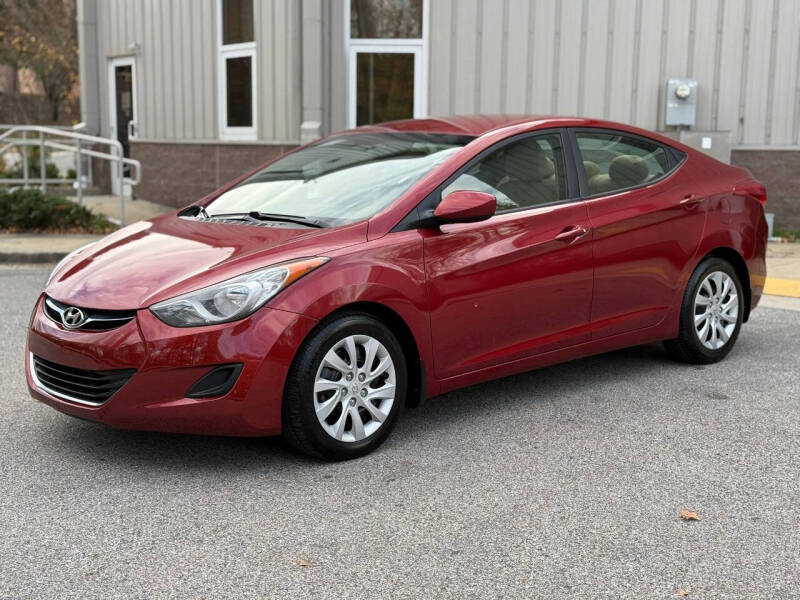 2013 Hyundai Elantra for sale at AMERICAR INC in Laurel MD