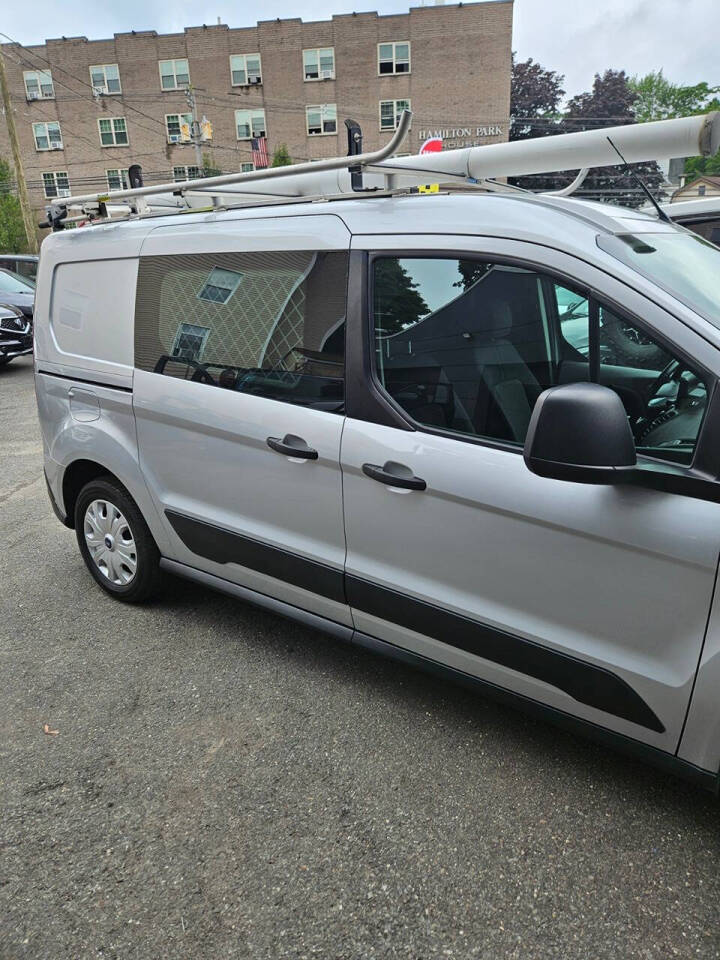 2019 Ford Transit Connect for sale at RENOS AUTO SALES LLC in Waterbury, CT