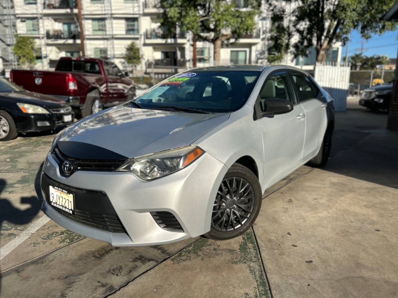 2015 Toyota Corolla for sale at Carmania in Panorama City, CA