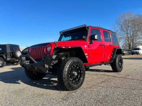 2010 Jeep Wrangler Unlimited for sale at CarWorx LLC in Dunn NC