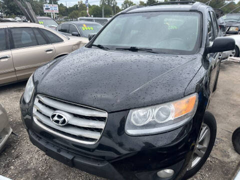 2012 Hyundai Santa Fe for sale at SCOTT HARRISON MOTOR CO in Houston TX