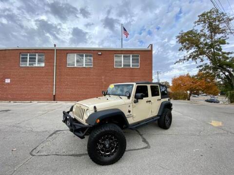 2011 Jeep Wrangler Unlimited for sale at ARCH AUTO SALES in Saint Louis MO