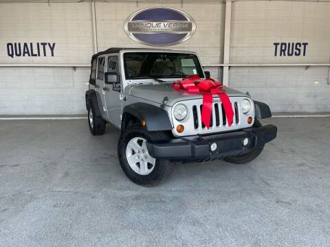 2012 Jeep Wrangler Unlimited for sale at TANQUE VERDE MOTORS in Tucson AZ