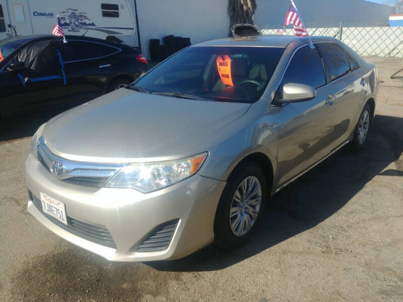 2014 Toyota Camry for sale at Alpha 1 Automotive Group in Hemet CA