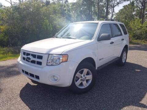 2009 Ford Escape Hybrid for sale at VICTORY LANE AUTO SALES in Port Richey FL
