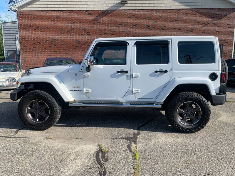 2012 Jeep Wrangler Unlimited for sale at BAY CITY MOTORS in Portland ME