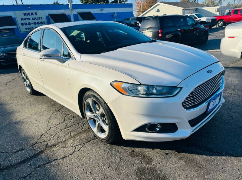 2013 Ford Fusion for sale at NICAS AUTO SALES INC in Loves Park IL