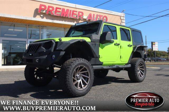 2012 Jeep Wrangler Unlimited for sale at PREMIER AUTO IMPORTS - Temple Hills Location in Temple Hills MD