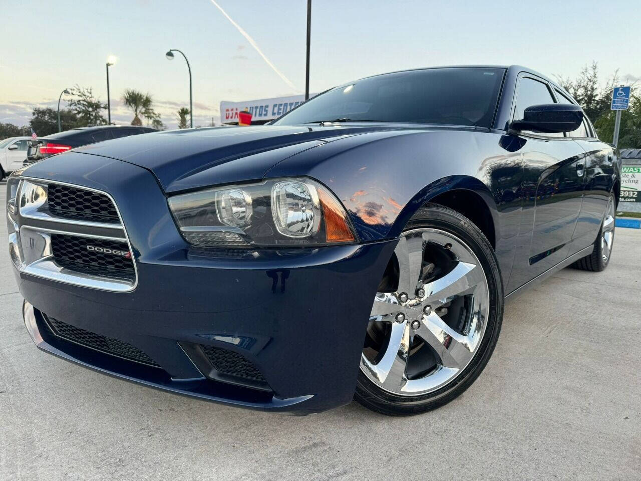 2014 Dodge Charger for sale at DJA Autos Center in Orlando, FL