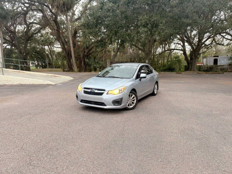 2013 Subaru Impreza for sale at Carnaval Auto Group LLC in Tampa FL