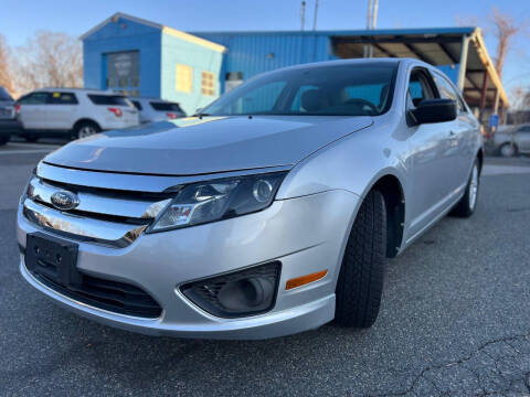 2012 Ford Fusion for sale at MGM Auto Group in Framingham MA