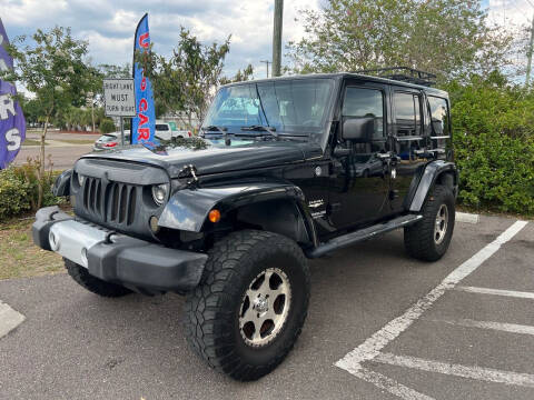 2012 Jeep Wrangler Unlimited for sale at Bay City Autosales in Tampa FL