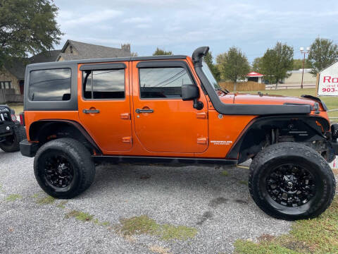 2011 Jeep Wrangler Unlimited for sale at The Jeep Stop in Sherman TX