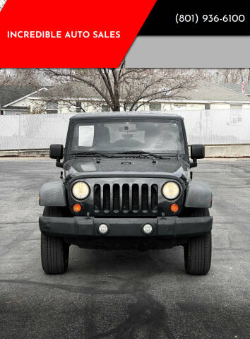 2011 Jeep Wrangler Unlimited for sale at INCREDIBLE AUTO SALES in Bountiful UT