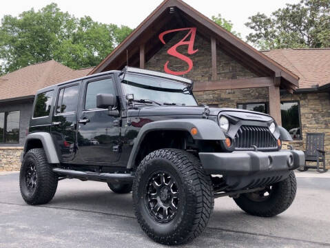 2013 Jeep Wrangler Unlimited for sale at Auto Solutions in Maryville TN